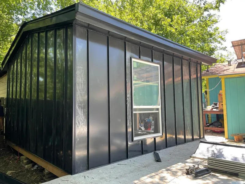 Black standing seam metal wall panels for Roof Inspection in Panthersville